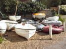 Good selection always available – A selection of used GRP, wooden tenders, inflatables and canoes.